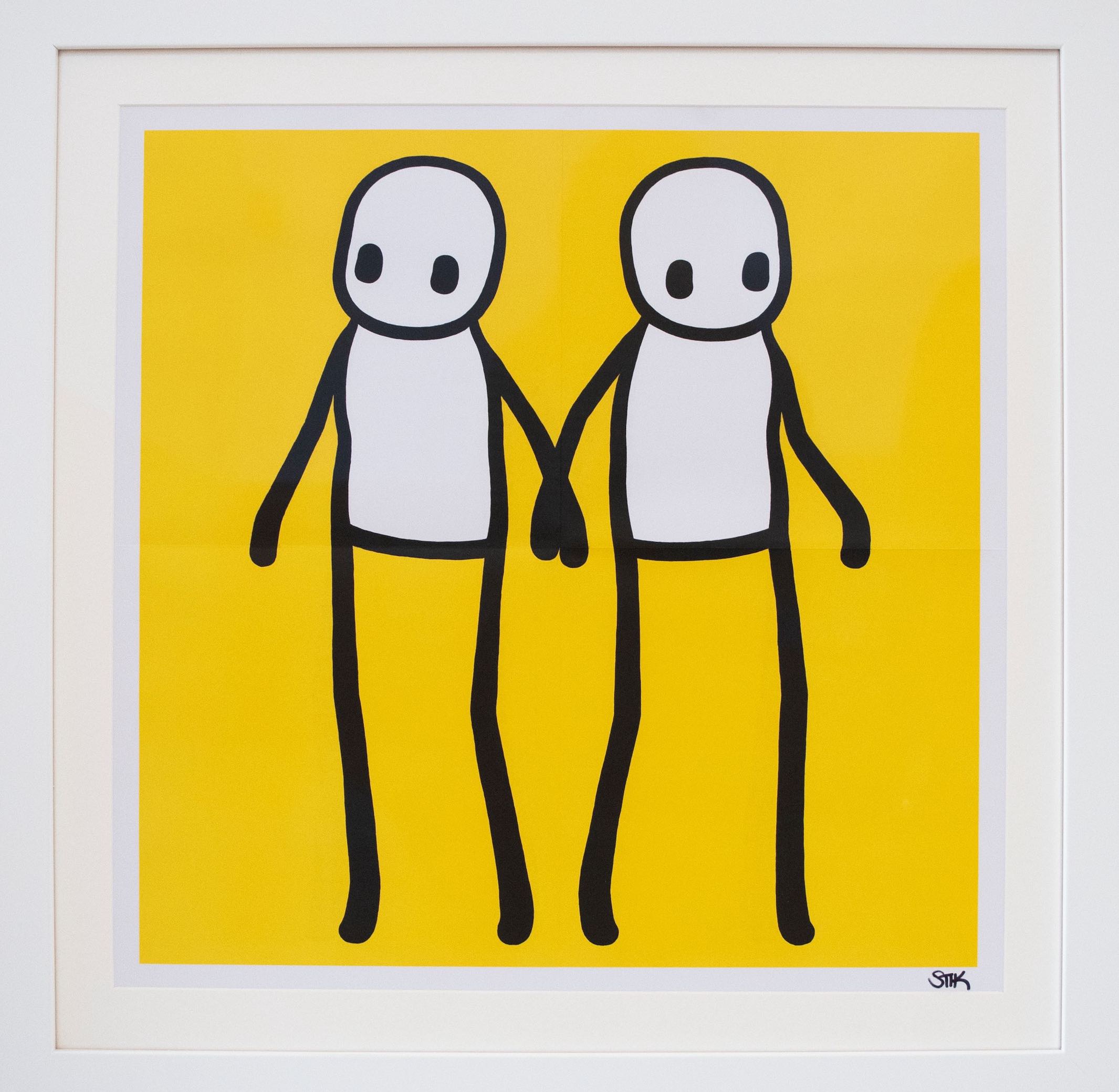 Stik Holding Hands Yellow 2020 Offset litograph in colours on wove paper Hand signed by the artist 50 x 50 cm 705 x 705 x 25 cm framed Credits Elena Domenichini